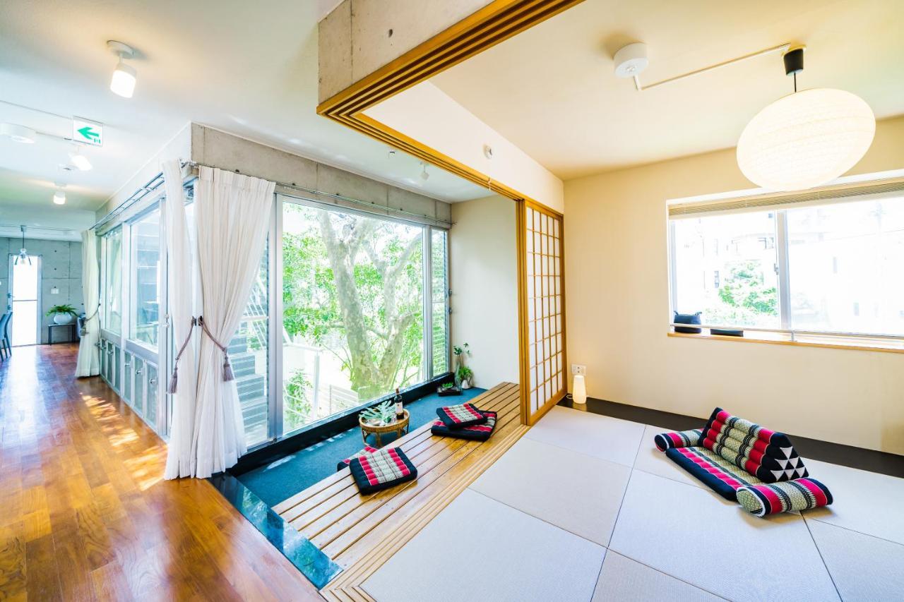 Em Tree House Villa Uruma Exterior foto