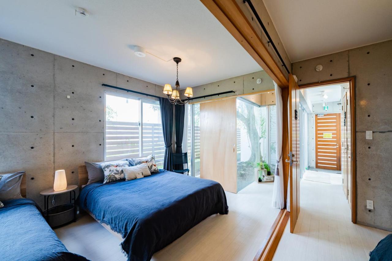 Em Tree House Villa Uruma Exterior foto
